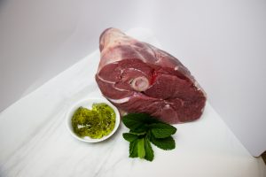 Lamb leg roast on display.